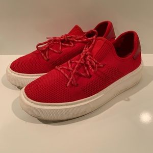 J Slides Damien red sneakers